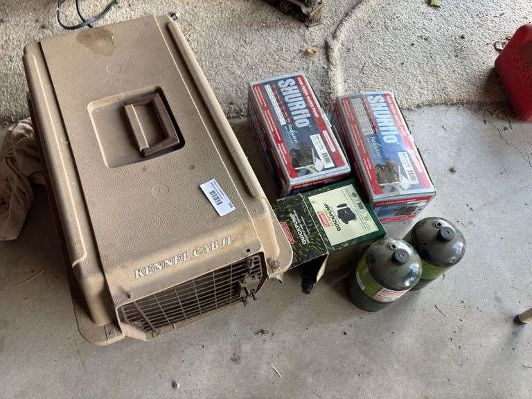 Freshwater pumps, quick pump, two small propane tanks, and a kennel cab 2 image
