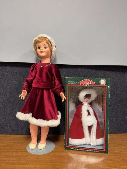 Uneeda Doll Co 32” holiday doll w sleep eyes and Holiday Moments porcelain doll in box image