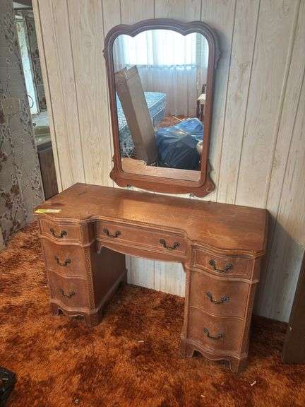 Vintage wood vanity table with wood framed wall mirror image
