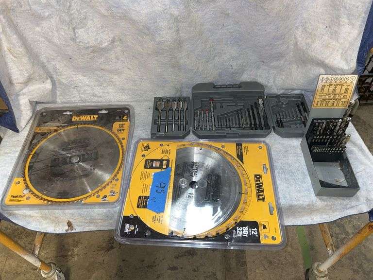 Dewalt 12-in saw blades one new 32 teeth, one used 32 teeth, one used 80 teeth. Craftsman drill bit box 1/8 in through 1/2 in some missing. AllTrade Professional drill bit set some missing. image