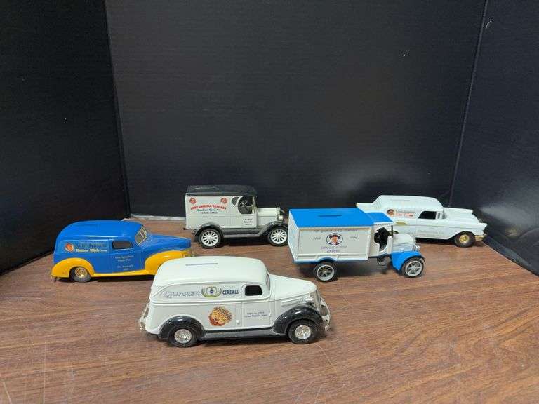 Five Quaker Oats coin banks image