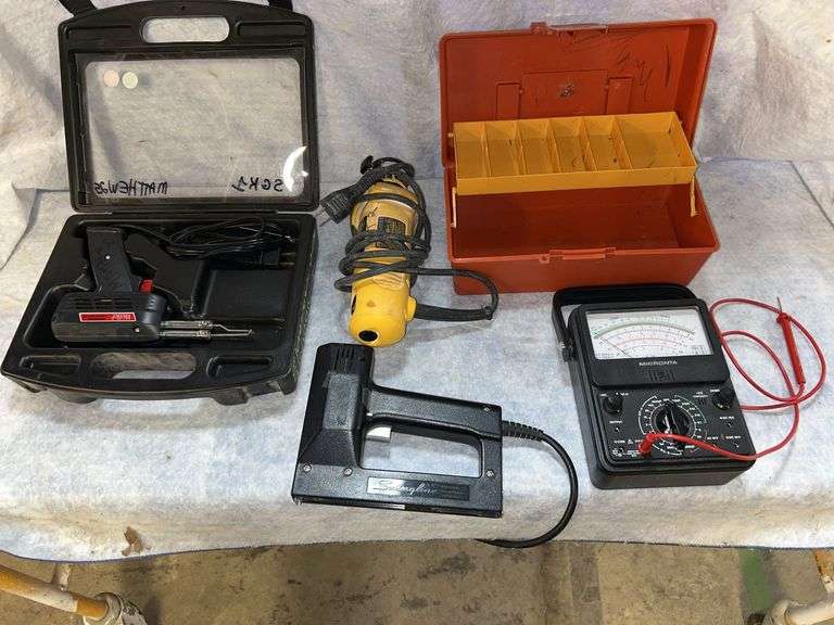 Weller soldering iron 140/100W, DeWalt dw660 cutout tool, 1/8-in Chuck, Micronta volt/ammeter/ohmeter, Swingline electric stapler, small tool/tackle box, 11 in wide by 5 in high by 6 in deep image
