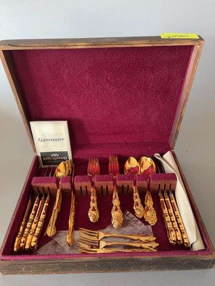 Mismatched set of “gold” flatware Not sorted, not counted image