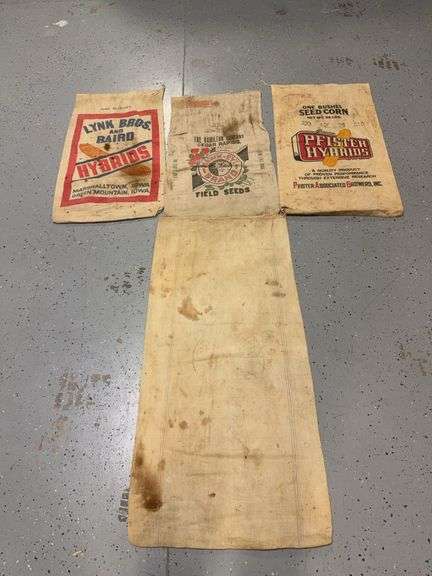 Four feed/seed bags as shown image