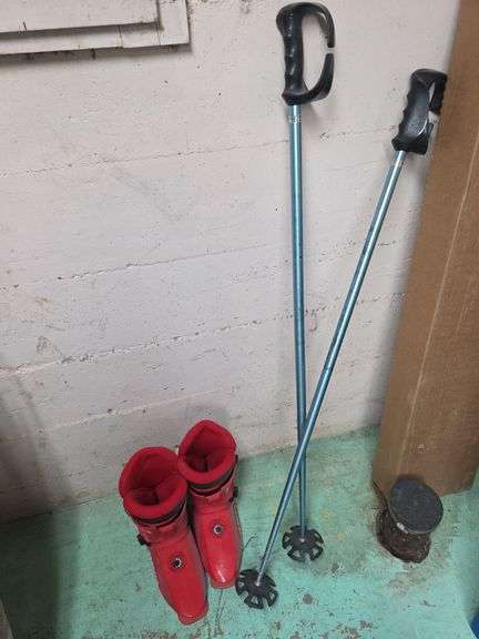 Cross country ski boots and poles image