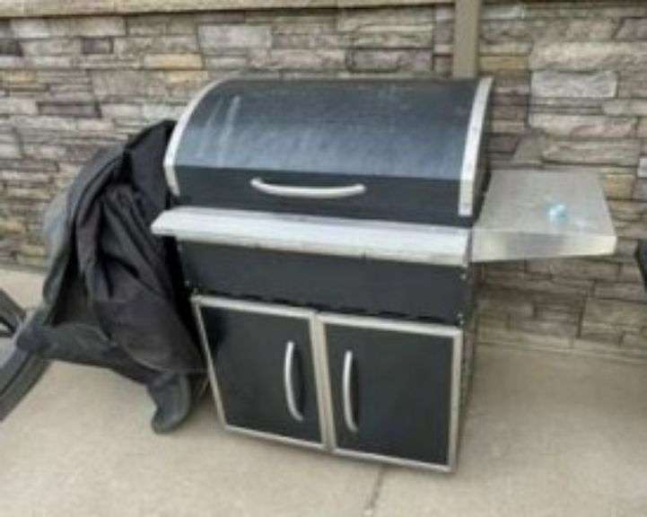 Traeger Grill, Approximately 3 Years Old, Hail Damage but Still Working image