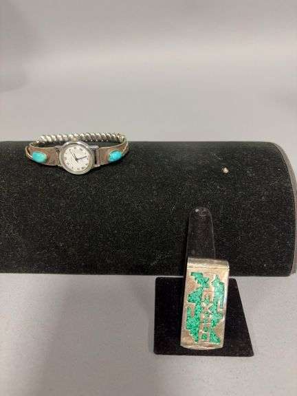 Possibly Turquoise accent watch and money clip image