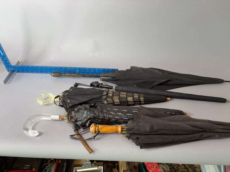 Five women’s parasols image