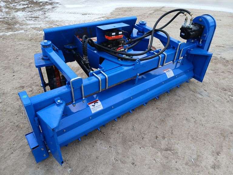 Skid Steer Soil conditioner	TOPCAT		SSSCR72	Quick Attach, (88) Carbide Tipped Teeth, 15-33GPM, Front Guide Wheels, 1100lbs.,72 width Harley Rake, skidsteer attachment image