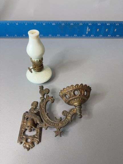 Miniature milk glass oil lamp w cast iron wall bracket marked “Little Harry’s Night Lamp” image