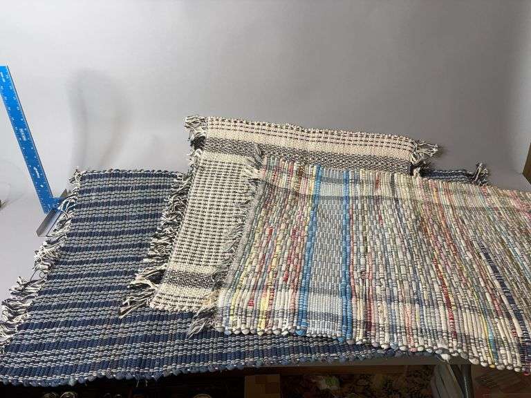 Three woven rugs image