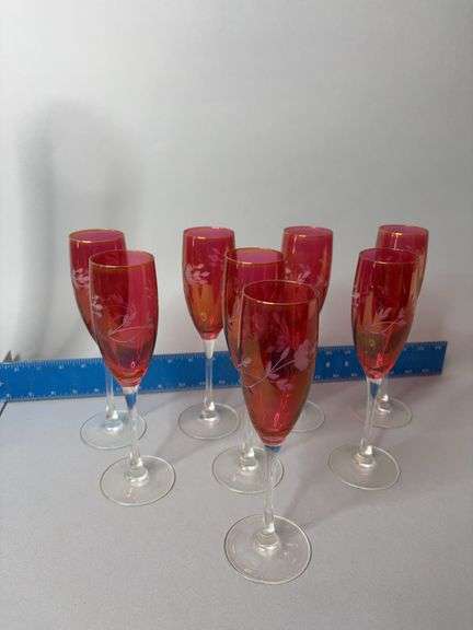Eight cranberry wheel etched wine glasses image