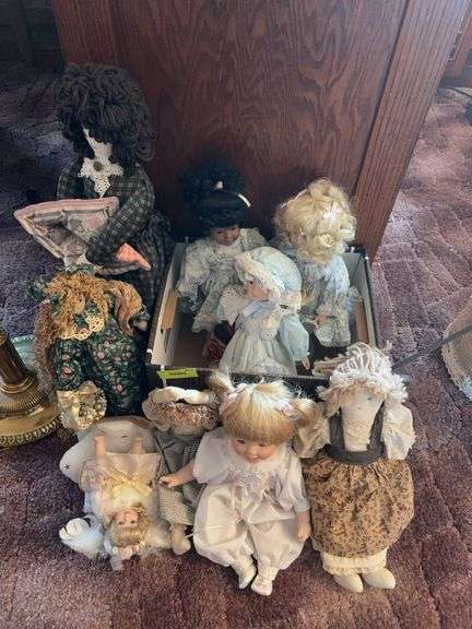 Large selection of dolls includes many cloth and some porcelain image