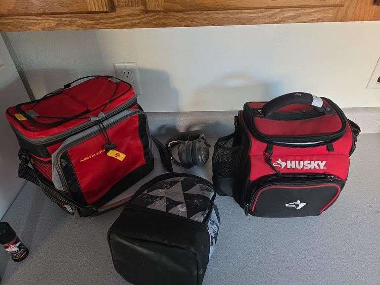 Lunch buckets and ear protection image