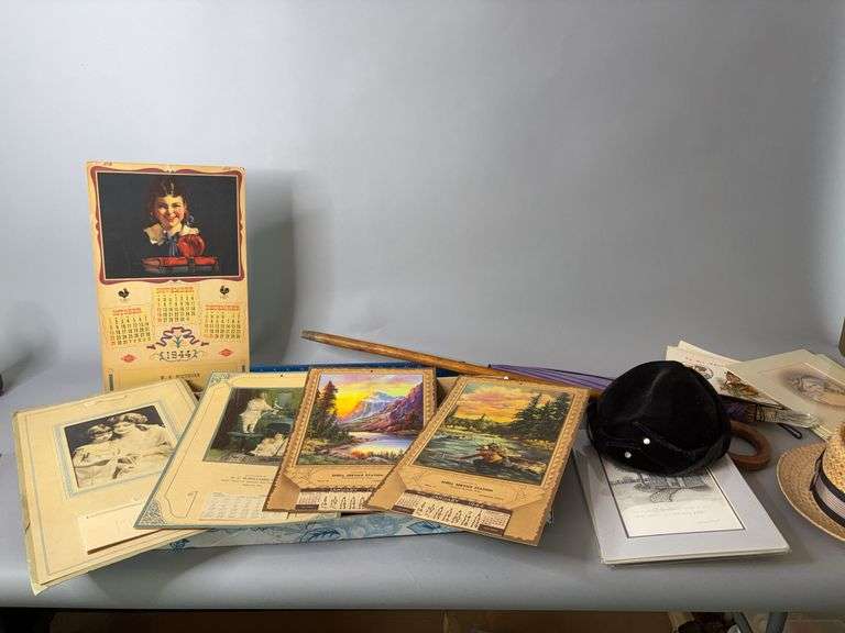 Box of ephemera, hats, cane, umbrella, pictures image