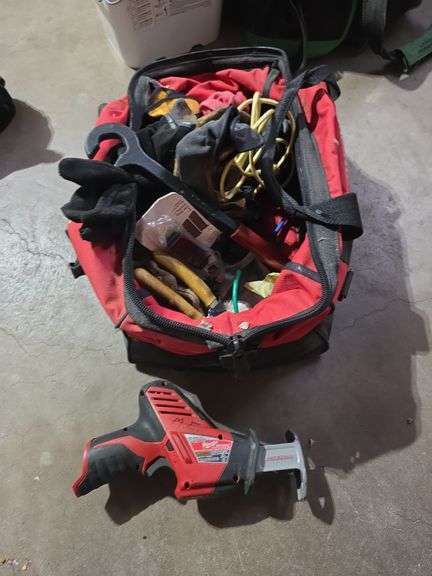 Milwaukee Hackzall (reciprocating saw) and bag of gloves image