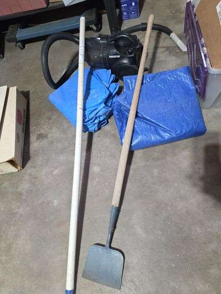 Oreck vacuum, tarps, wire fishing rods, scraper image