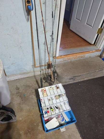 Fishing poles and tackle box image