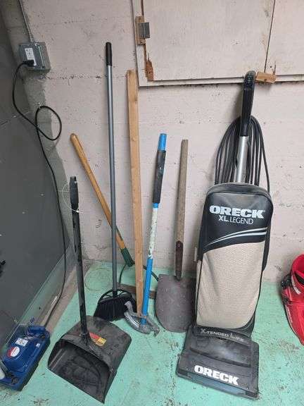 Half inch EMT bender, dust pan, vacuum, spade and broom image