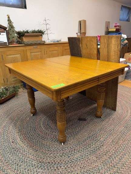 42" square oak table with (3) 11" leaves image