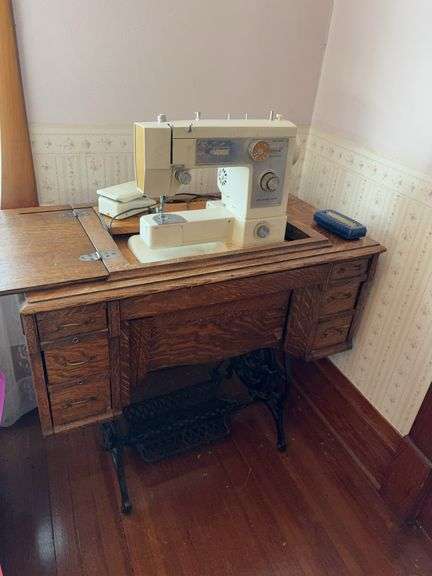 Quarter sawn oak treadle sewing machine cabinet w/ modern sewing machine Front panel needs repair image
