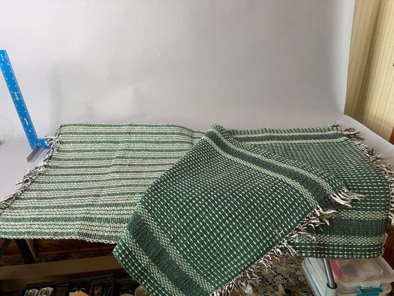 Two green woven rugs, 26” x 46” image