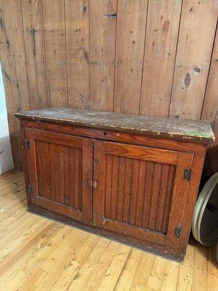 Old store cupboard base with wainscotting doors, 21D x 50L x 32H image