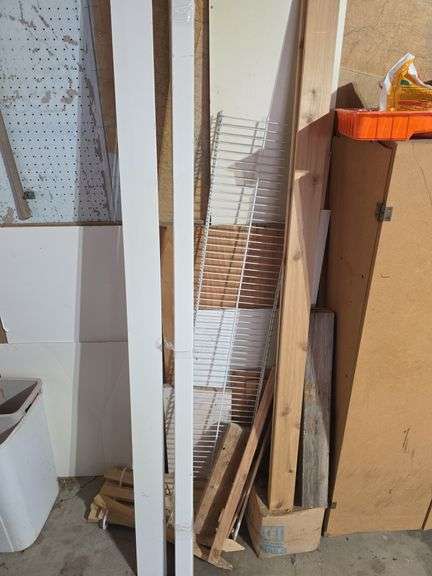 Scrap wood, metal shelf, stakes image