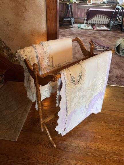 Quilt rack and fancy handiwork image