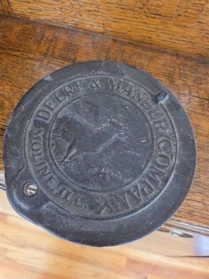 Deere and Mansur Company Molene Illinois, Cast iron stove part image