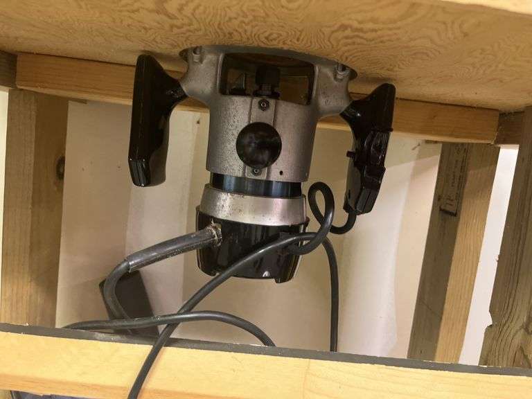Sears Craftsman router model 315.17381 on homemade stand with Sears Craftsman router/sabre saw table model 25444