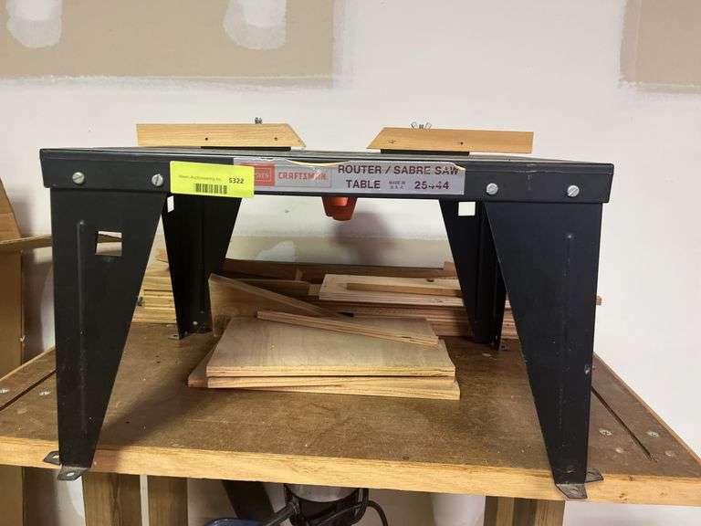 Sears Craftsman router model 315.17381 on homemade stand with Sears Craftsman router/sabre saw table model 25444