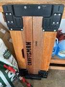 Craftsman wooden car creeper, car ramps, oil dry, single jack and a Club