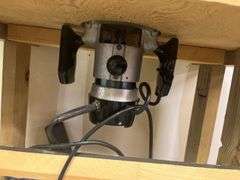 Sears Craftsman router model 315.17381 on homemade stand with Sears Craftsman router/sabre saw table model 25444