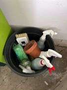 Green bookshelf and gardening items, shoes, fiberglass driveway markers, sprinkling cans etc...