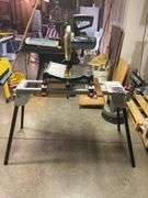 Ryobi 10” compound miter saw Model TS1342 mounted on Skil miter saw stand Model 3300MS