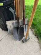 Snow shovel, round point, maul, potato fork and large garbage can w/ lid