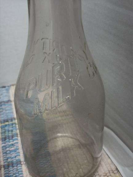 8 bottle carrier with 3 milk bottles