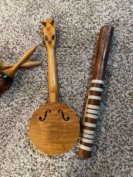 Rain stick, mini banjo, harmonica and maracas