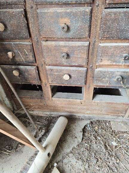30 drawer pine cabinet w 4 missing drawers 18D x 32L x 59H
