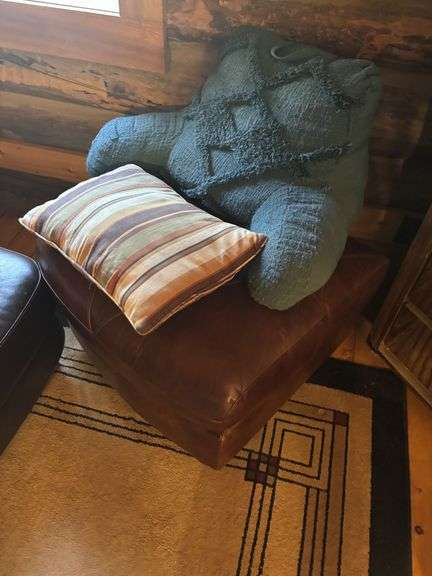 Pair of arm chairs with ottomans - both have large wear spots