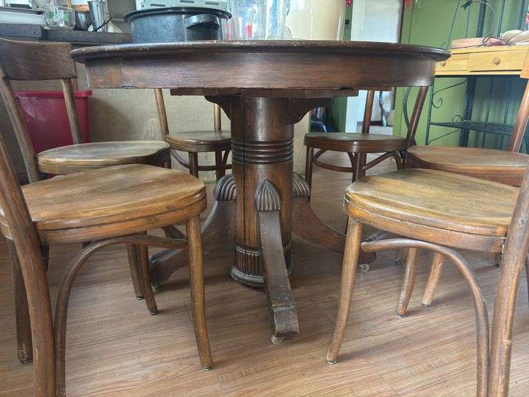 Antique dining room table with 6 chairs