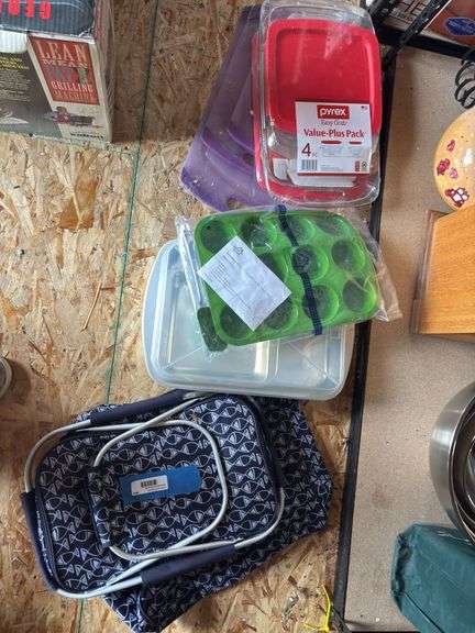 Brand new Pyrex baking dishes, new cutting boards, silicone muffin pan, cooler bags