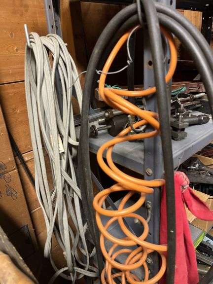 Level, vise, screwdrivers, air hose and drop cord Shelf 2 & 3, L side of shelf