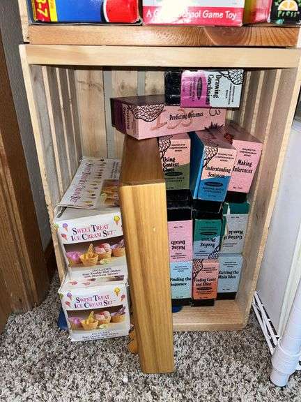 4 wood crates w/ all kinds of games and education materials