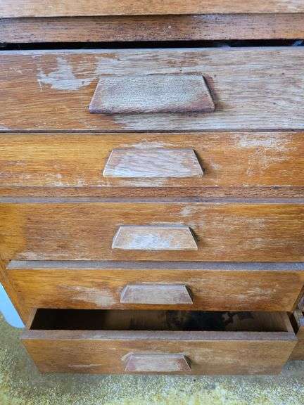 2pc oak cupboard with glass door top and 10 drawer base 26D x 56L x 90H Bring tools to take apart!