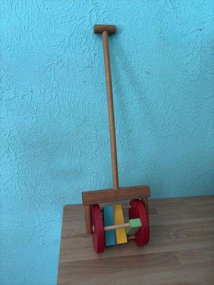 Box of many old blocks, different sizes and very annoying roller toy