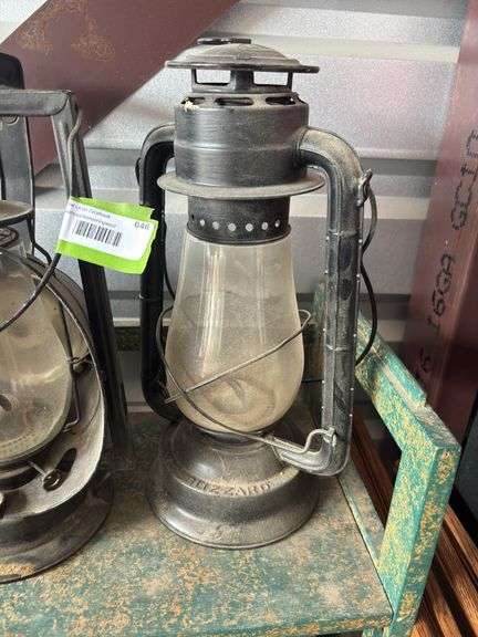 Two Dietz lanterns and two small skaters lanterns