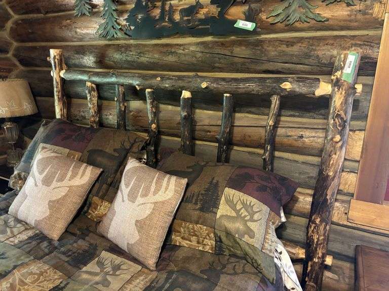 QUEEN sized knotty pine bed frame with mattress box spring and linens