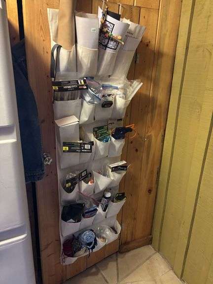 Household fix-it type items, and craft supplies in closet plus over the door storage